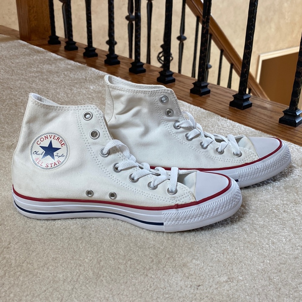 Converse. Brand new. Never been worn. White. Women’s size 8.